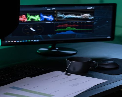 Modern computer monitor displaying documentation under optimized office ambient lights
